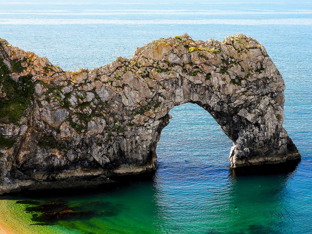 South West Coast Path walking tour at Jurassic Coast include visiting the famous Durdle Door