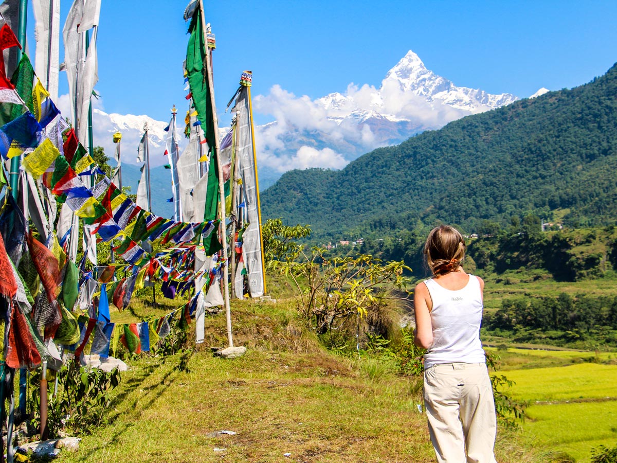 Looking at Machhapuchhre mountain on Family Adventure Tour in Nepal