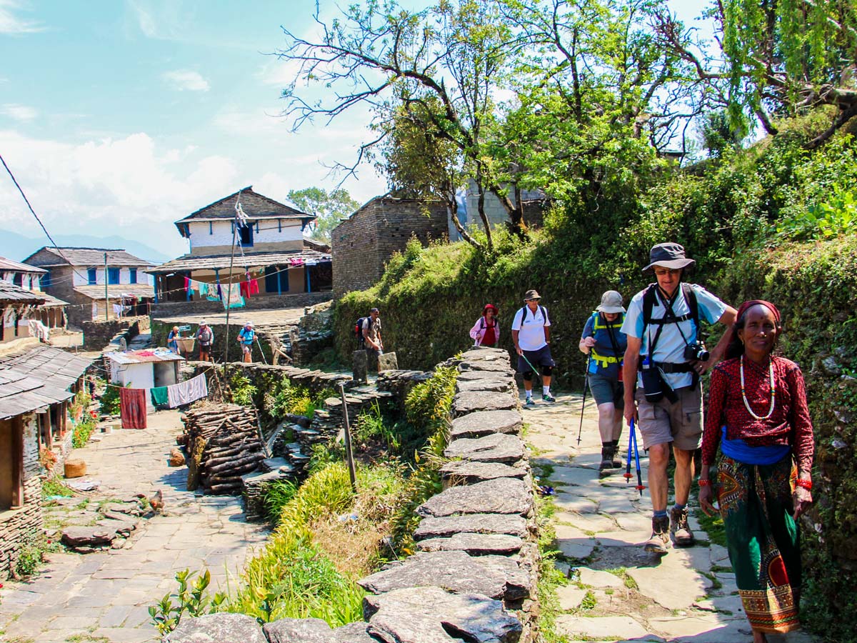 Hiking in Himalayan village on Family Adventure Tour in Nepal