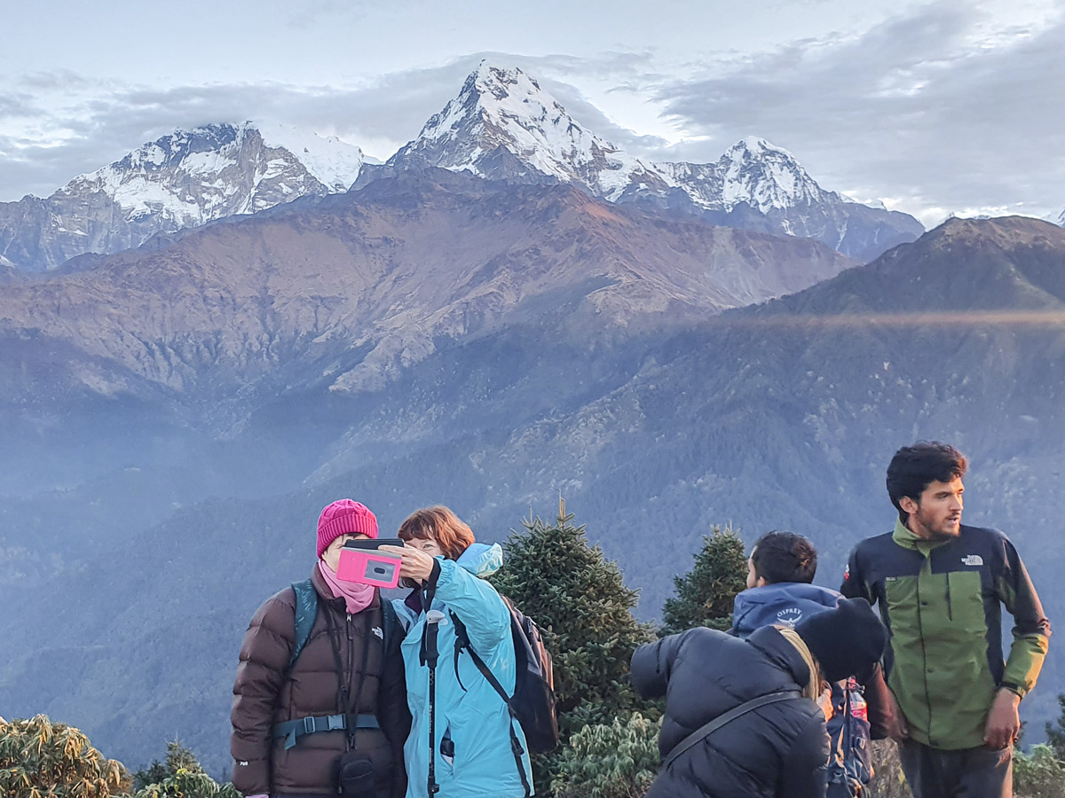 Taking pictures on Ghorepani and Poon Hill trek in Nepal