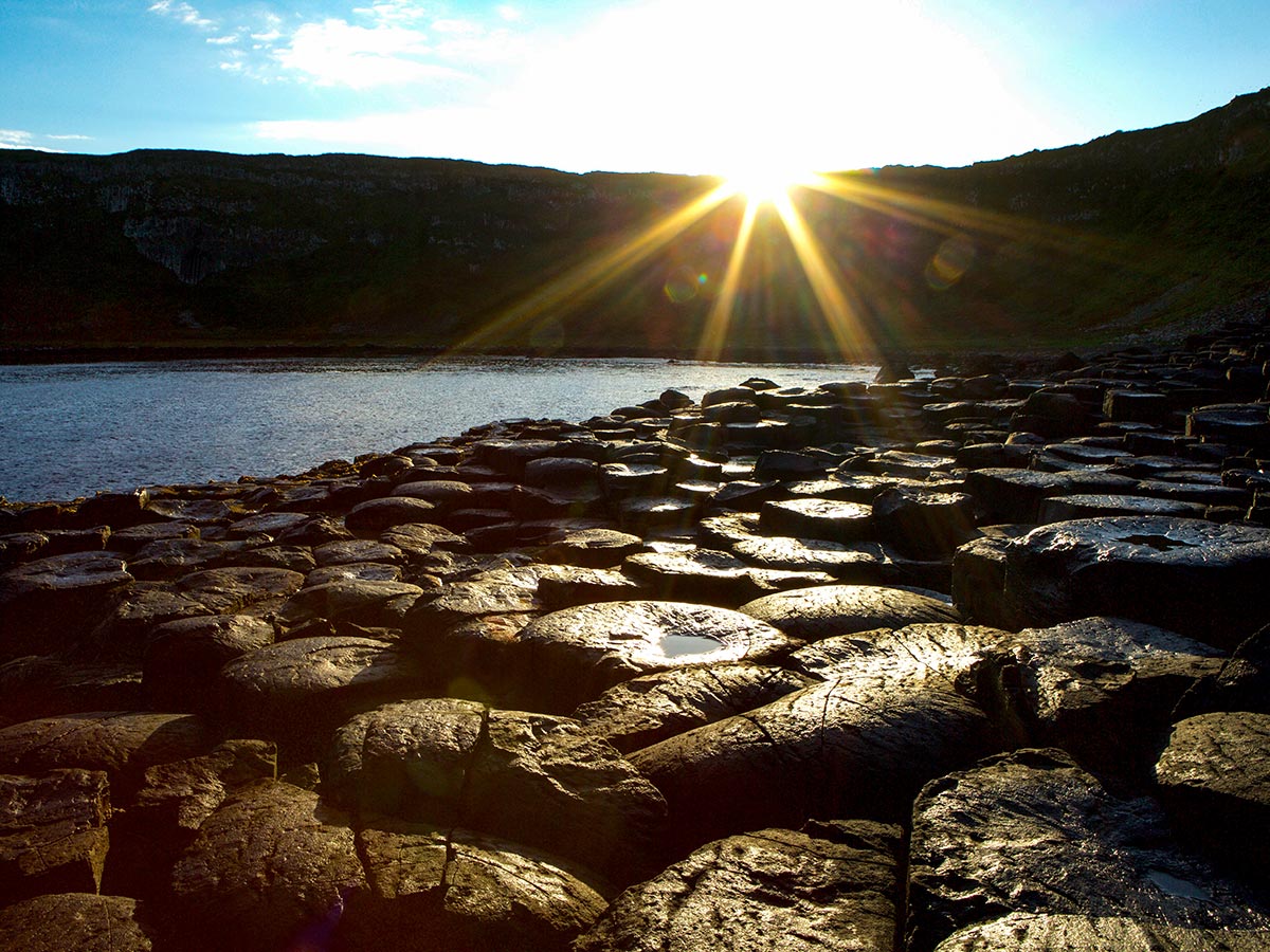 Sunrise at Giants Causeway as seen on Coastal Causeway Route & Donegal Trek