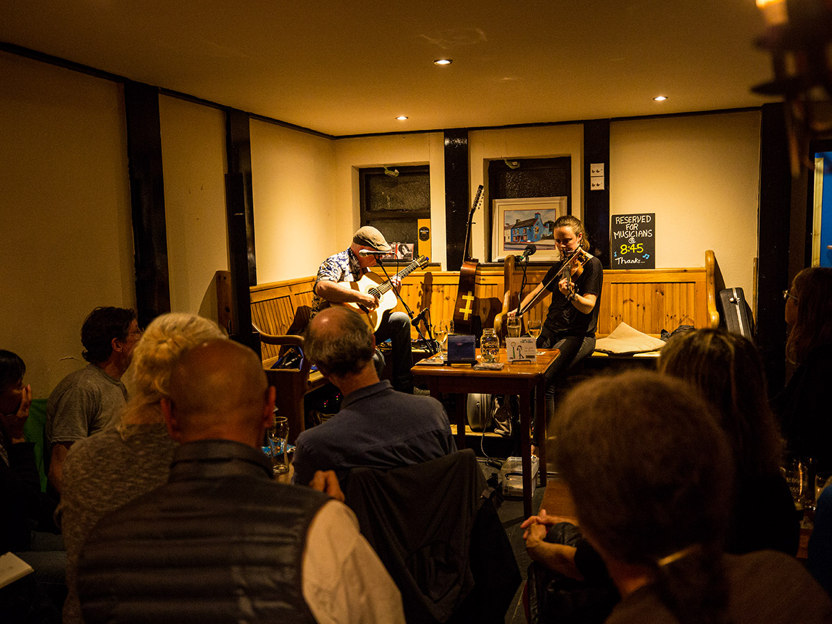 Listening to Dingle Music on Deluxe Hiking Kerry Mountains tour