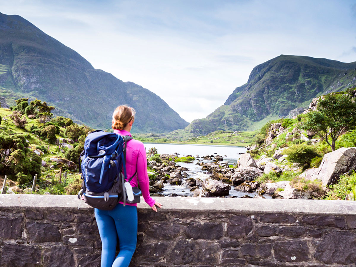 Crossing the Wishing Bridge while on Deluxe Hiking Kerry Mountains tour