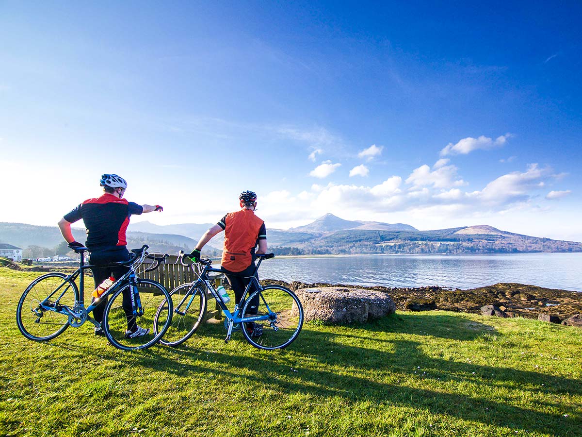 Two bikers looking at the sea in Scotland on Arran Islay and Jura Road Biking Tour