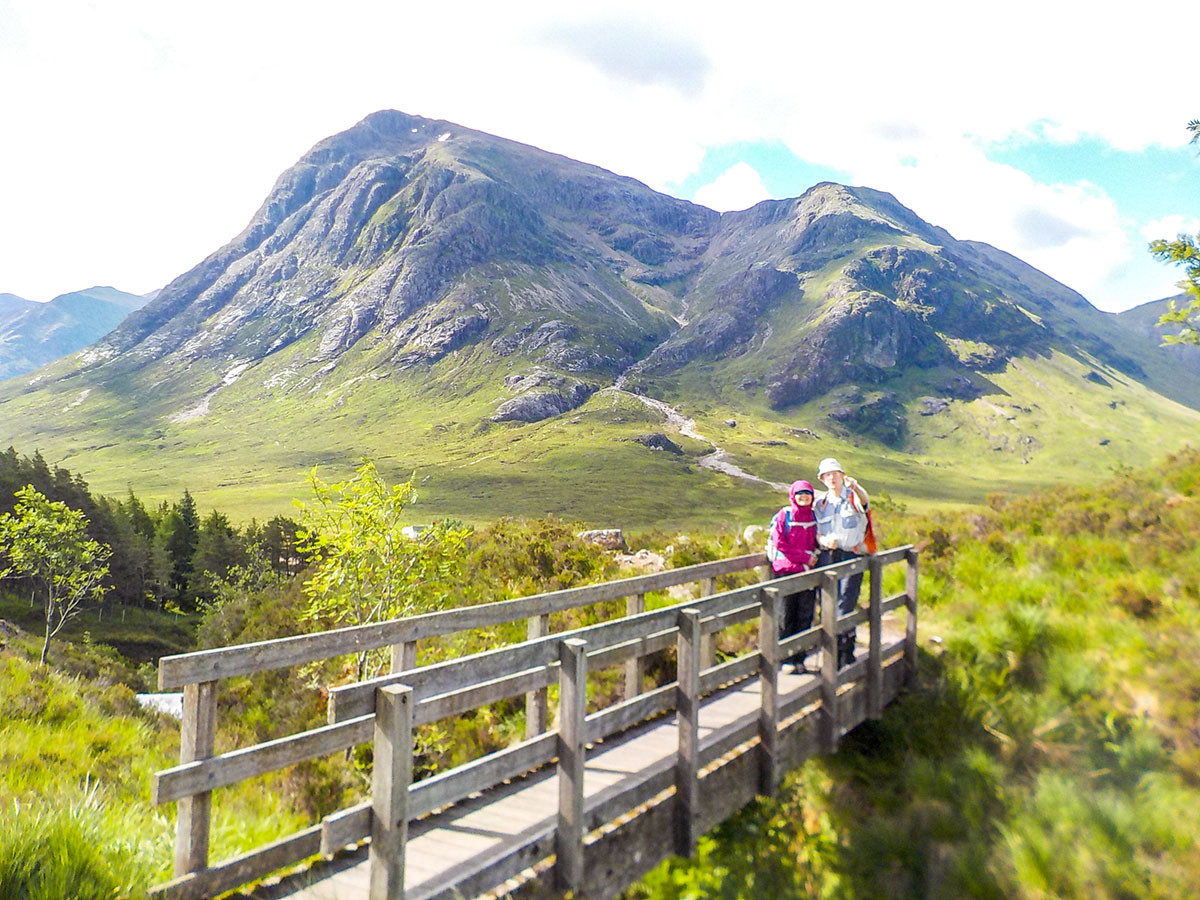 Crossing the bridge on Glencoe and the Highlands trekking tour in Scotland