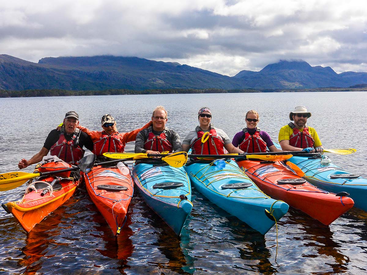 Group of kayakers on Sea Kayaking in Scottish Highlands Tour