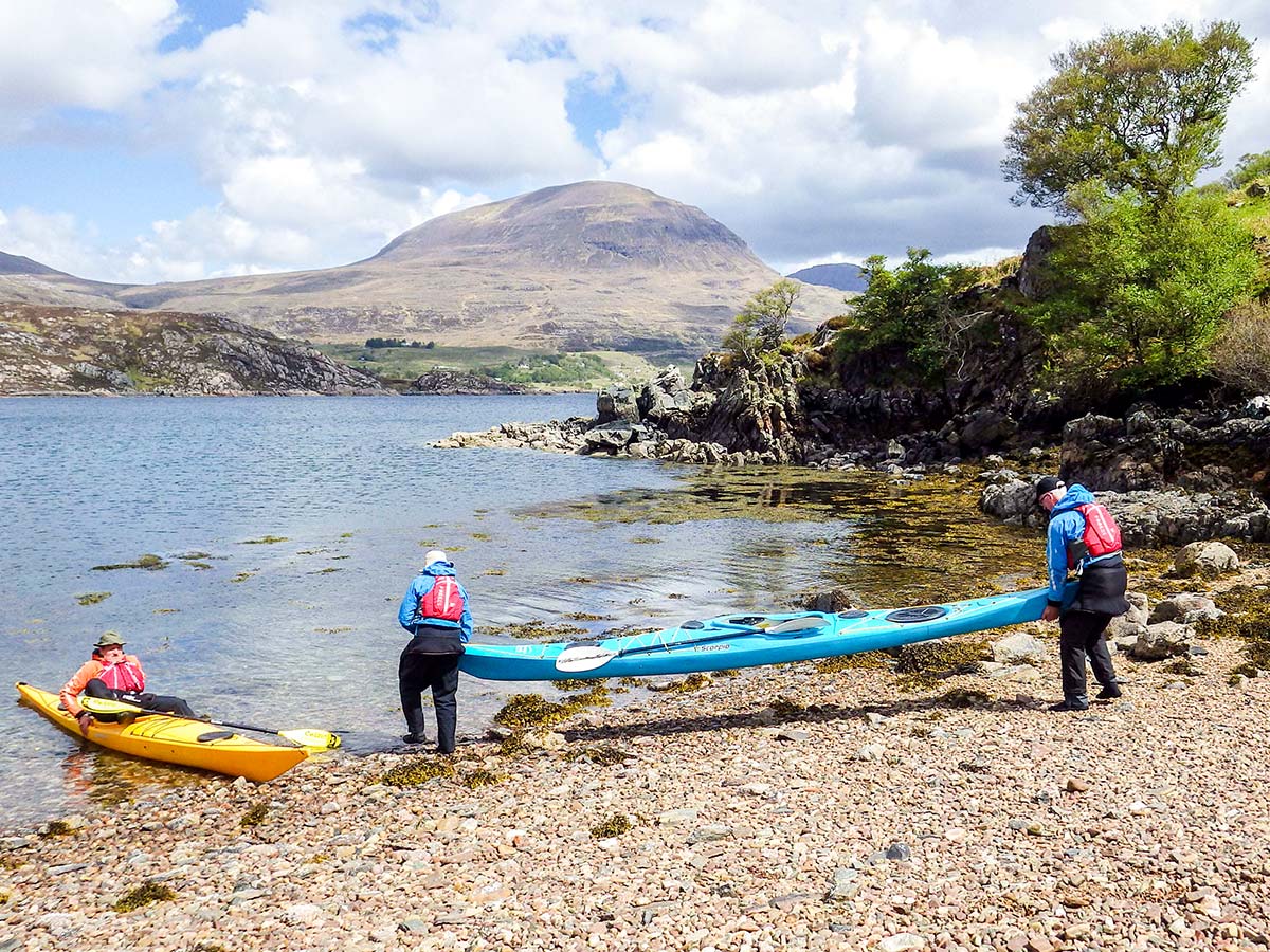 Boarding the kayaks on Sea Kayaking in Scottish Highlands Tour in Scotland