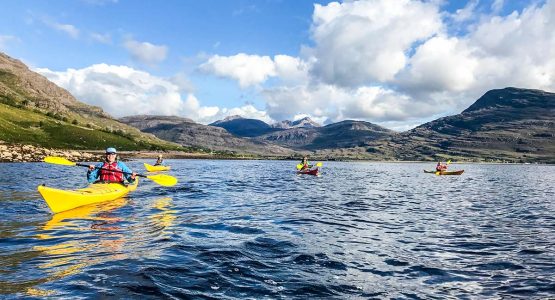 Kayaking on a big Loch on Sea Kayaking in Scottish Highlands Tour