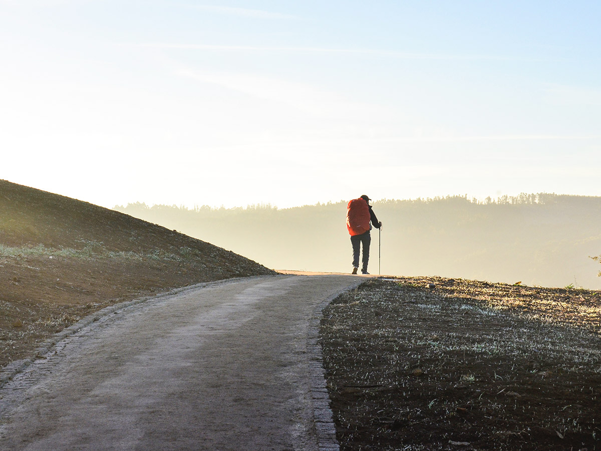 Lone hiker on Camino de Santiako walking tour near Santiago