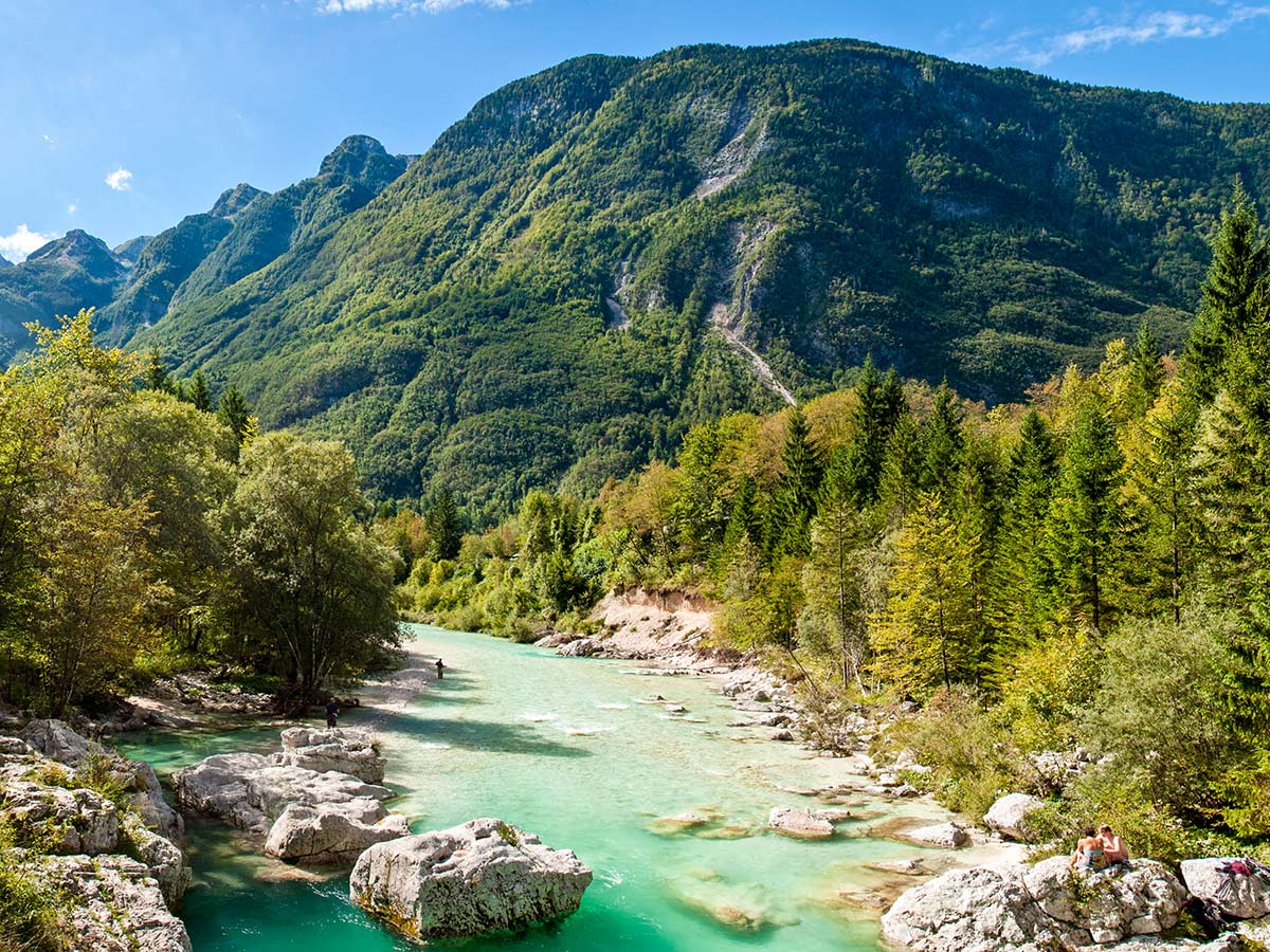 Turquoise creek in Soca Valley Slovenian Alps