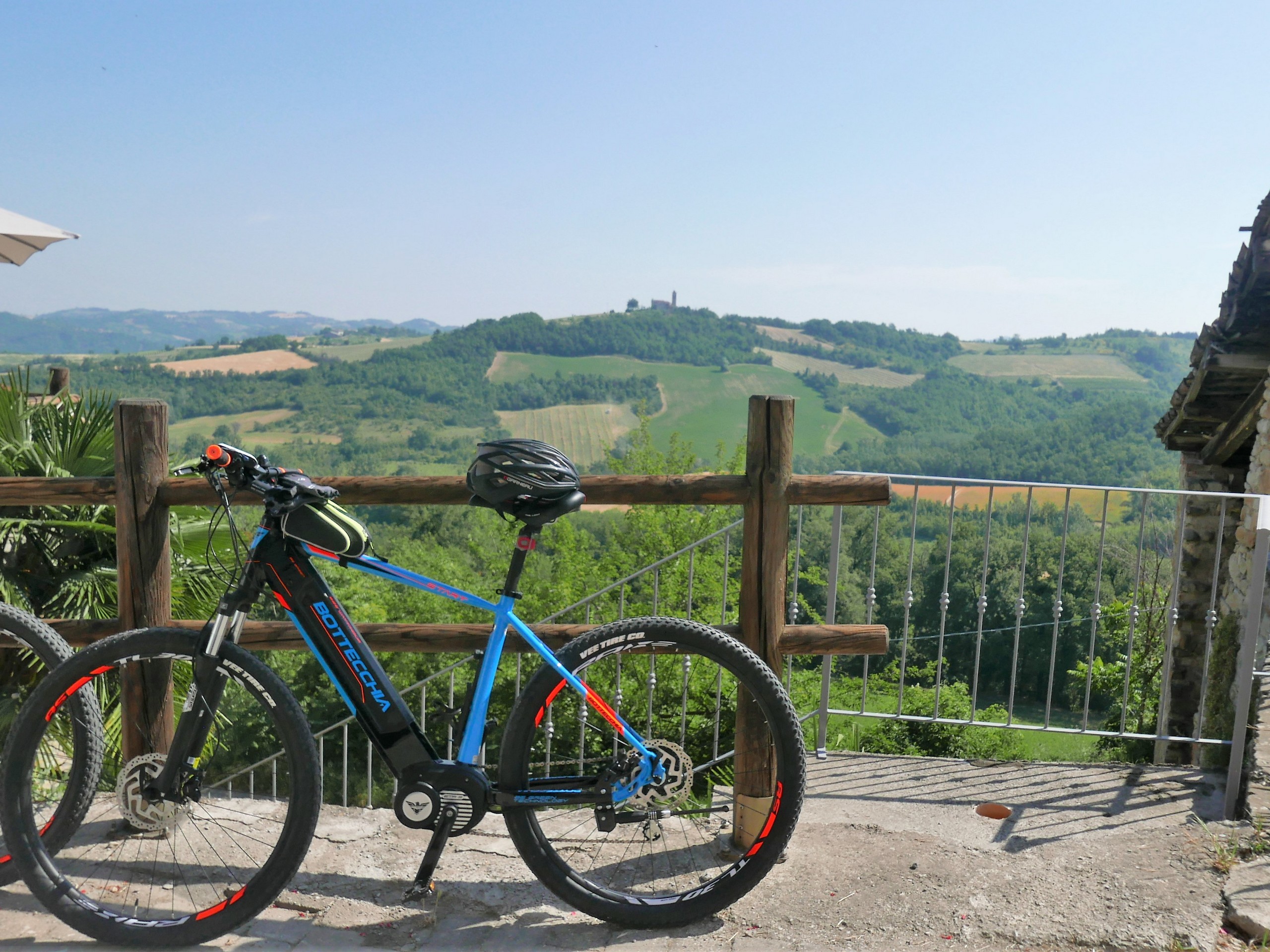 E-bikes lined in front of the Piedmont's countryside