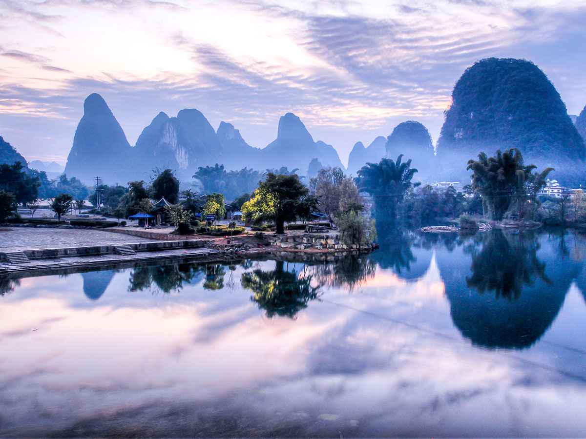 Fog over Yangshuo seen on a biking tour in China