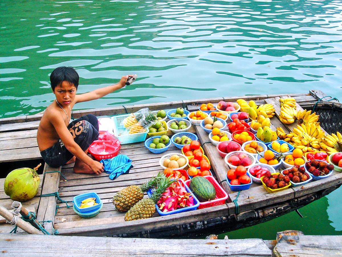 Floating boat in Halong Bay seen on Vietnam Tropical Journey Tour