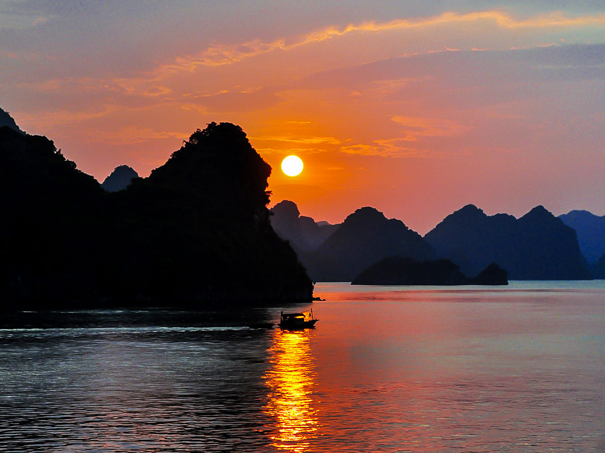 Sunset over the bay on Best of Vietnam Trekking and Cruising Tour