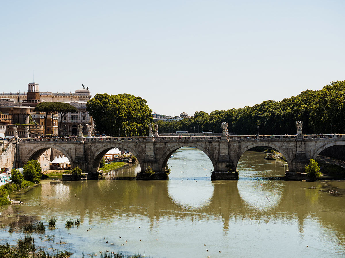 Crossing the old bridge on Via Francigena Tour from Viterbo to Rome