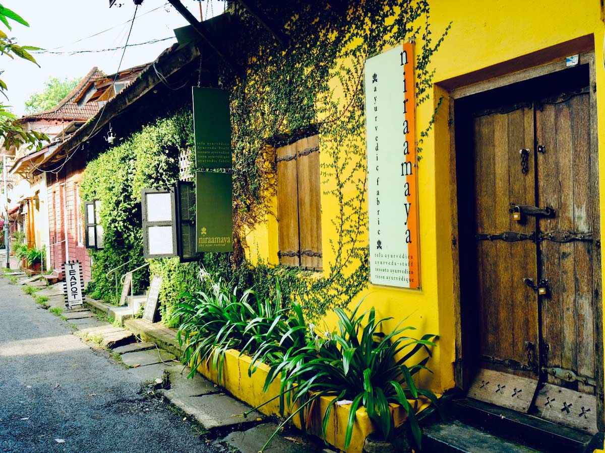 Colorful building in Cochin seen on Biking in Western Ghats tour