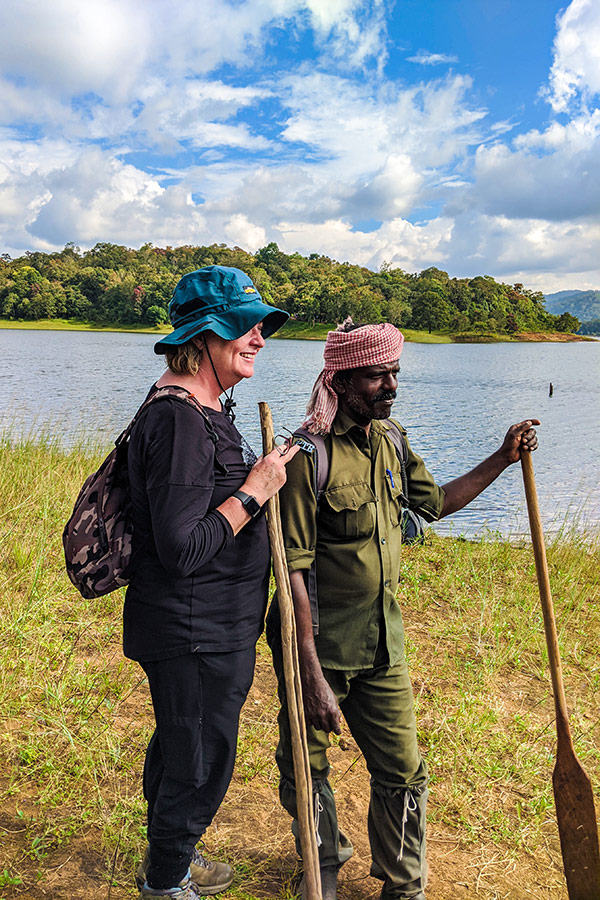 Hiker with a guard on Western Ghats Luxury Trek with a guide in Kerala India