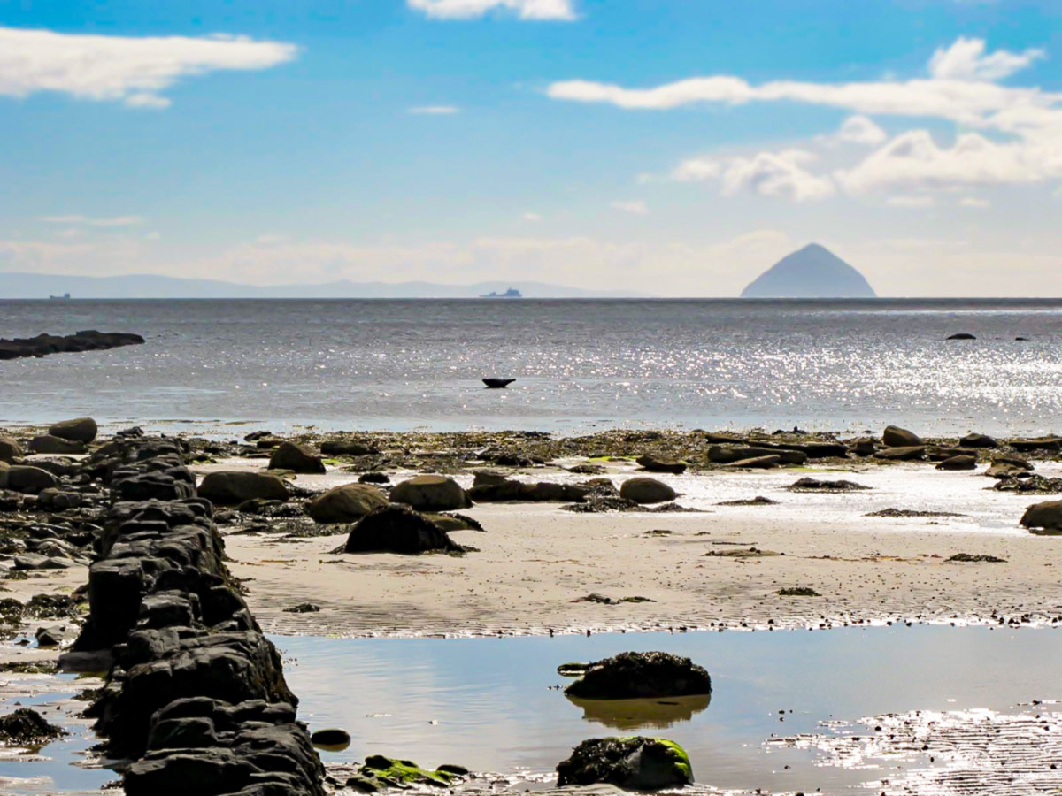 Beautiful view to Ailsa Craig seen on Clyde Islands Whiskey Tour in Scotland