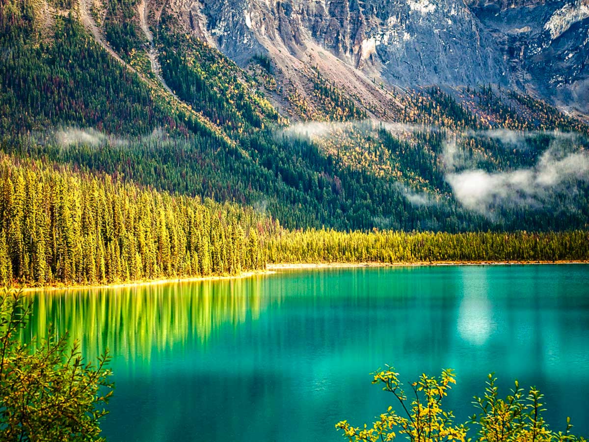 Beautiful mountains surrounding the Emerald Lake near Lake Louise