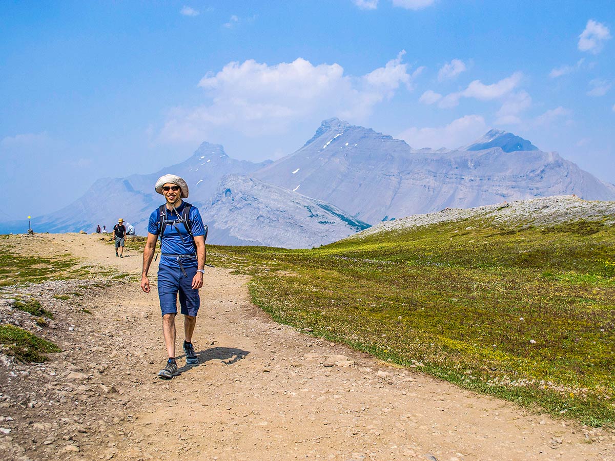 Happy hiker on a route to Parker Ridge in Canadian Rockies