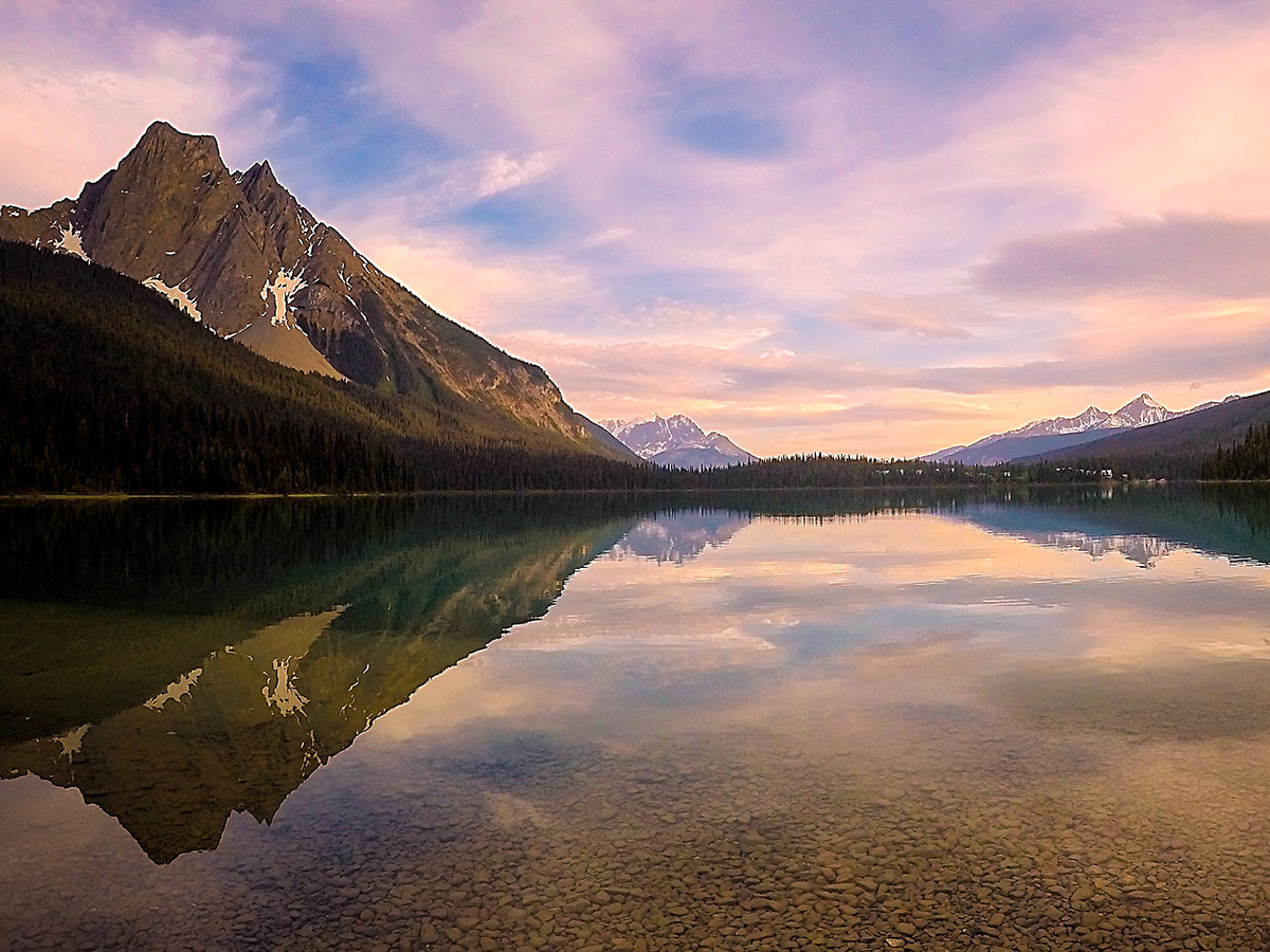 Sunset over the calm lake in the Canadian Rocky Mountains