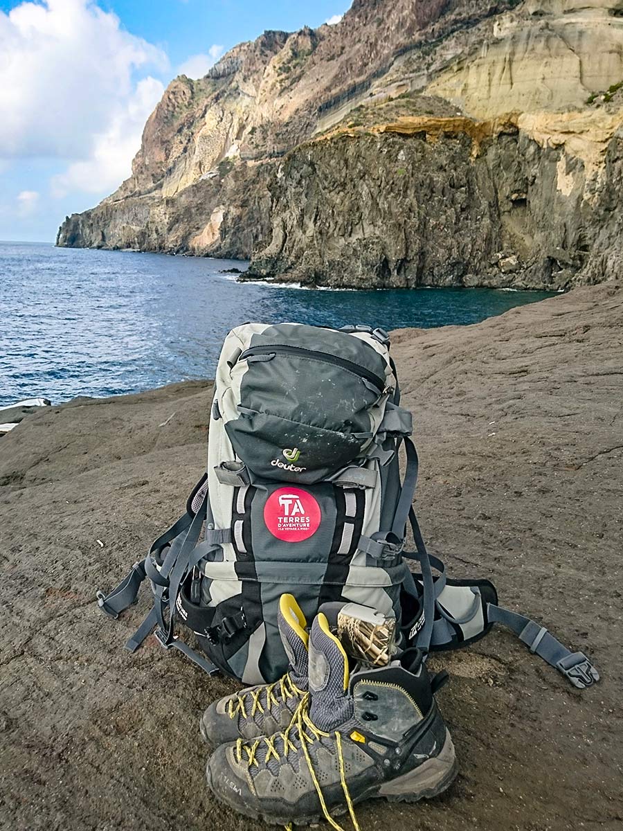 Backpack and hiking shoes in Pantelleria