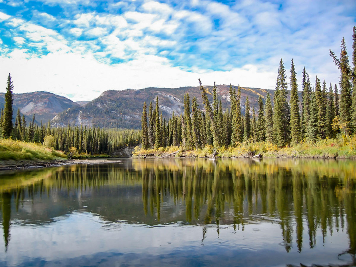 Mirroring views of the Big Salmon River in Yukon