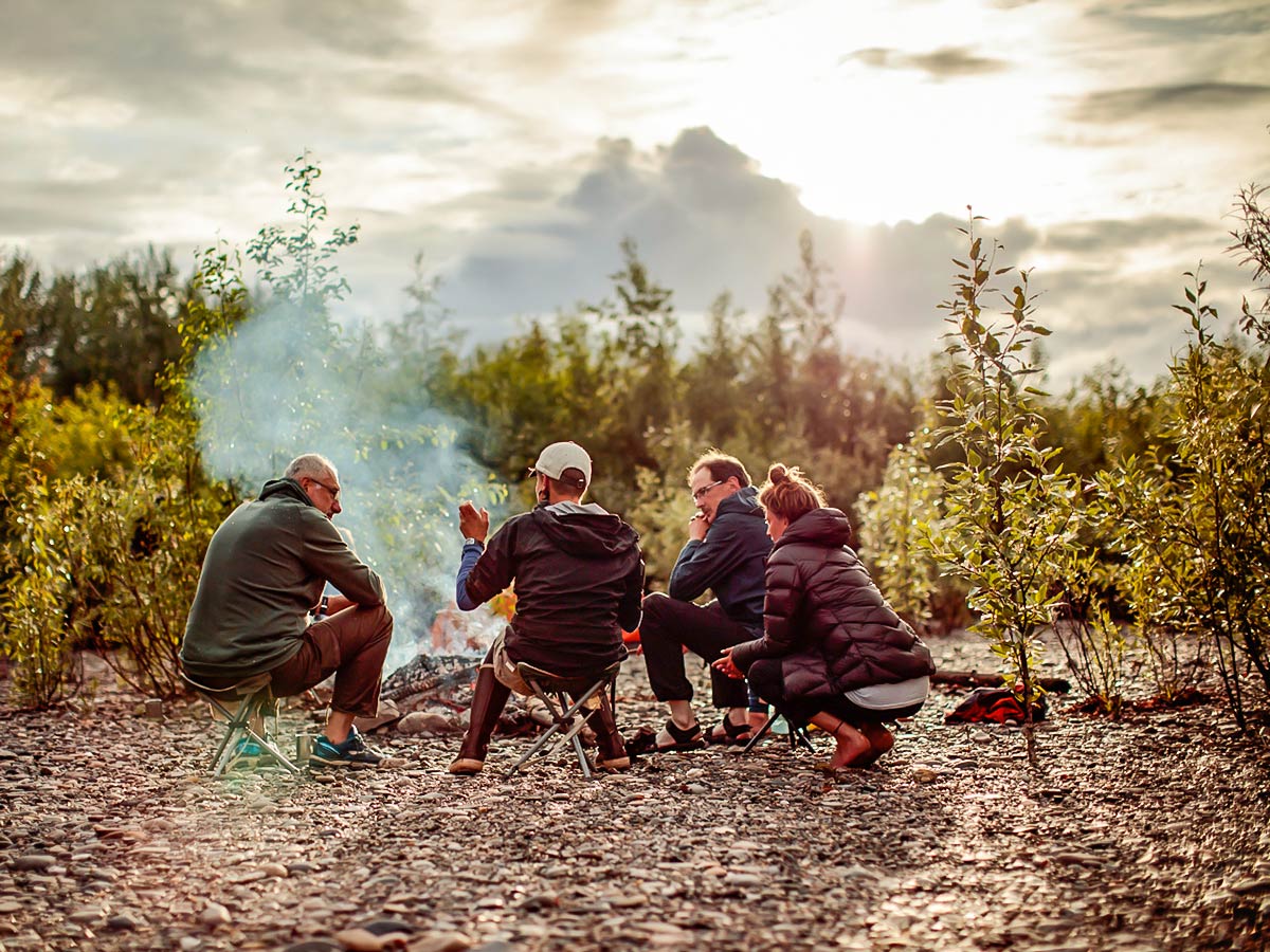 Dinner by camp fire near Yukon River