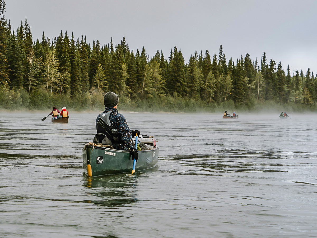 Early morning paddle in Yukon River, Canada