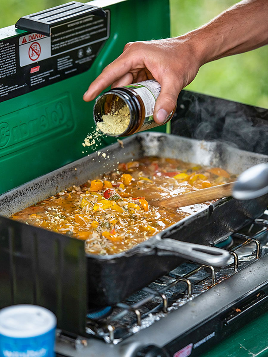 Cooking the dinner on a guided Yukon River Canoeing Tour in Canada