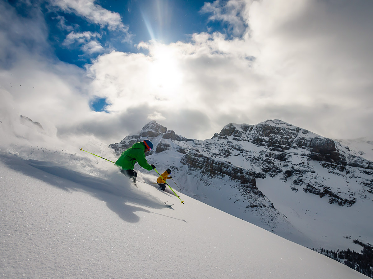 Two skiers on downhill ski trip