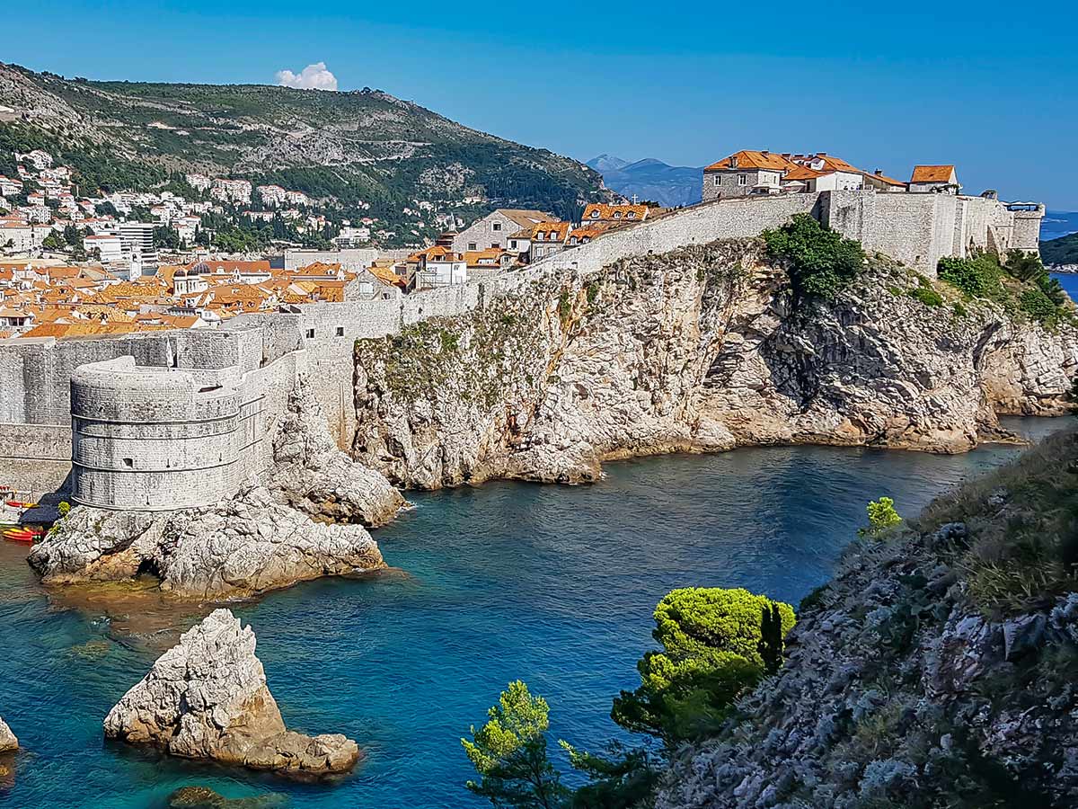 Old city walls of Dubrovnik seen on a sailing tour from Split to Dubrovnik