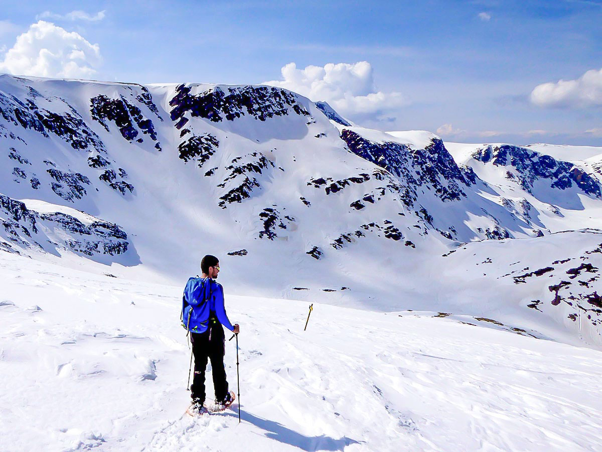 Lone snowshoer near Rila in Bulgaria met on snowshoeing tour