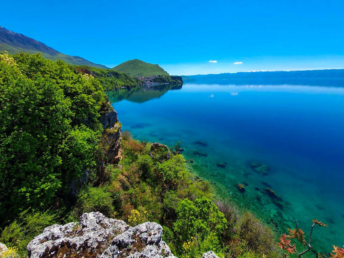 Hiking the Western Balkans tour rewards with some stunning views, such as Ohrid Lake view in Macedonia