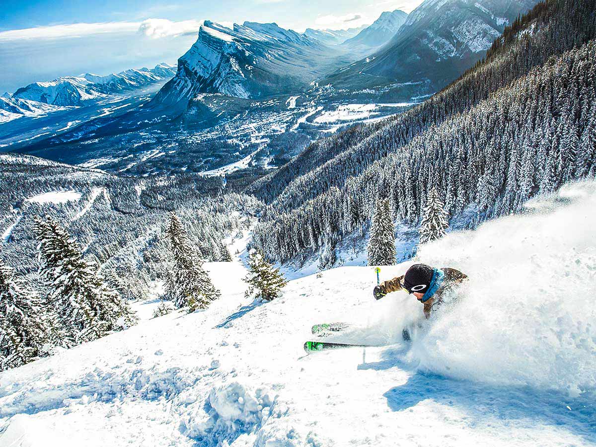 Skiing down the slopes of a mountain resort