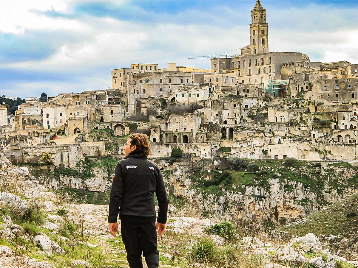 Hiker looking at Matera on guided Puglia and Matera tour in Italy