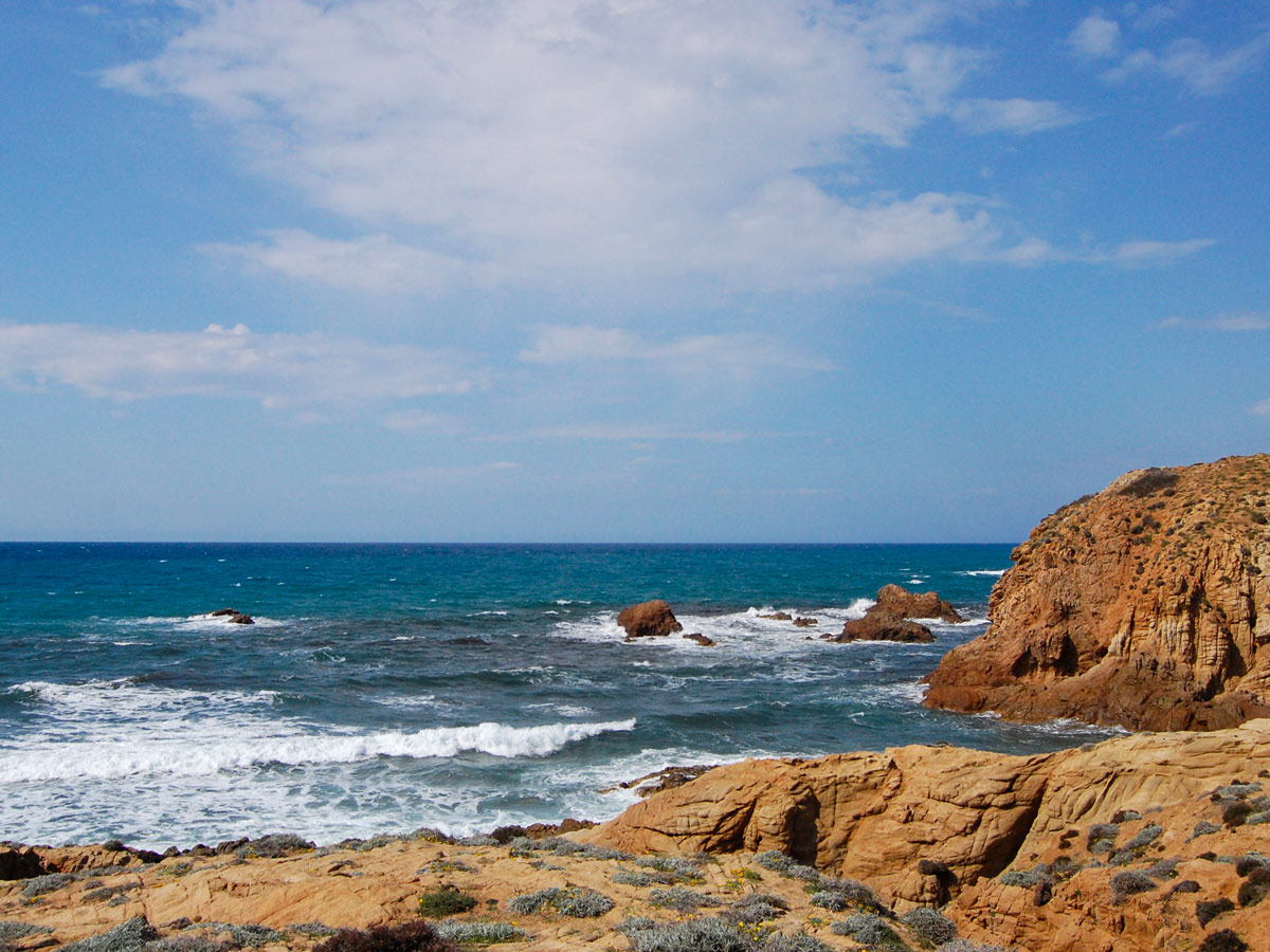 Rocky Mediterranean Sea shore in Sardinia Italy
