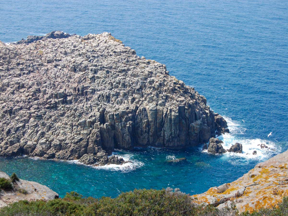 Rocky sea views along the route of self guided biking tour in Sardinia Italy