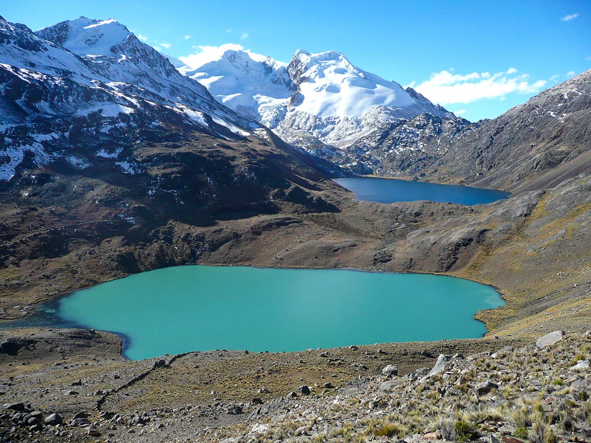 Two mountain lakes along the Cordillera Real trek