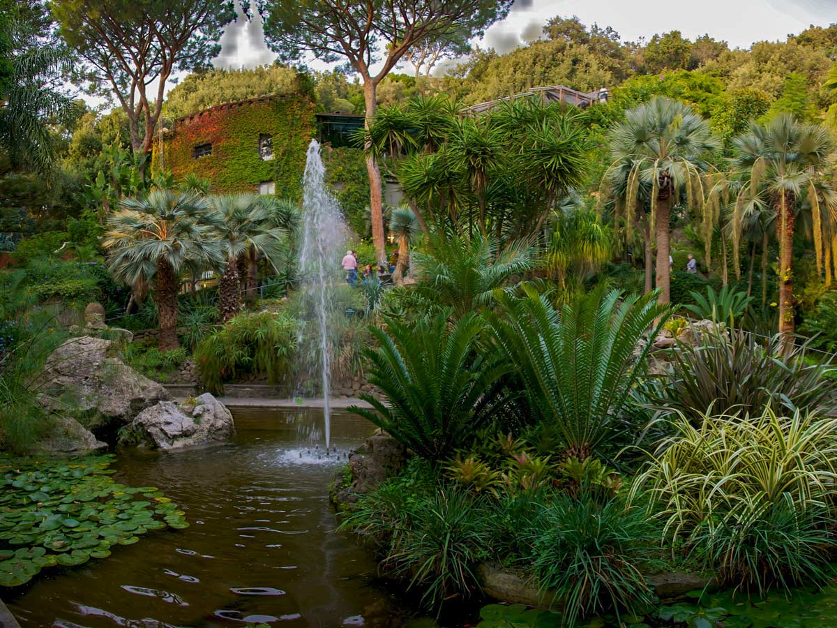 Stunning waterfall in La Mortella Gardens in Campania Italy