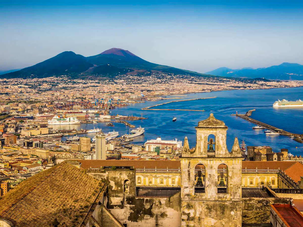 Naples view from above with Mount Vesuvius behind the city