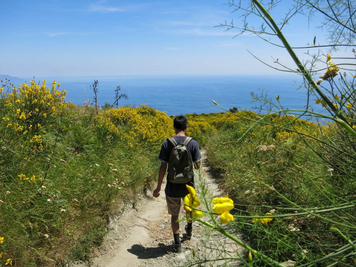Hiker walking along the Gulf of Naples in Italy
