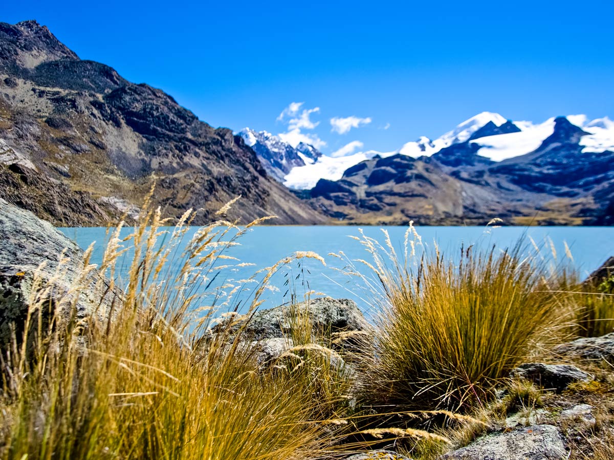 Andean wilderness in Apolobamba blue lake snowy mountain peaks image by V.