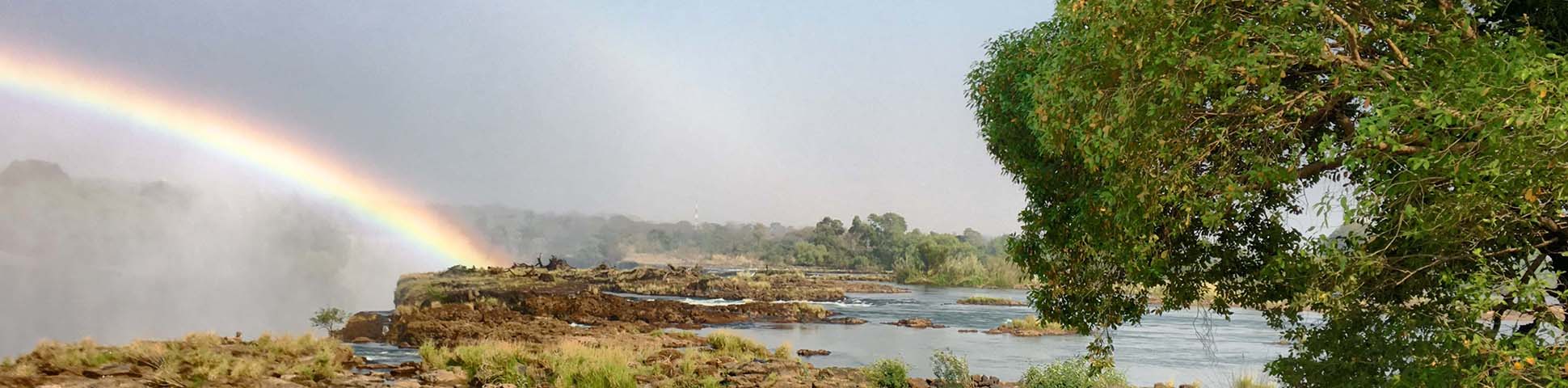 Panoramic View of the rainbow over the Victoria Falls