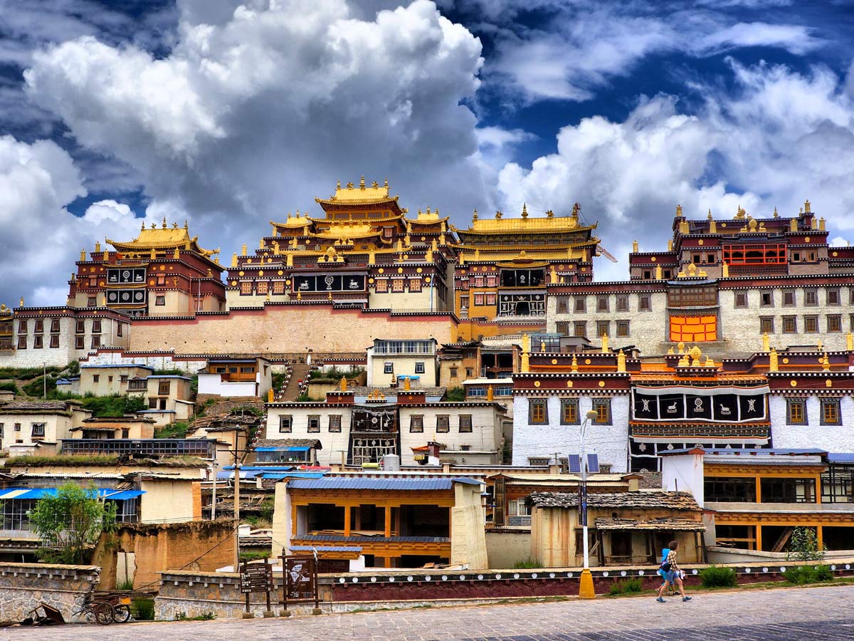 Colourful buildings of Sumzanlin Monastery seen along trekking tour through China