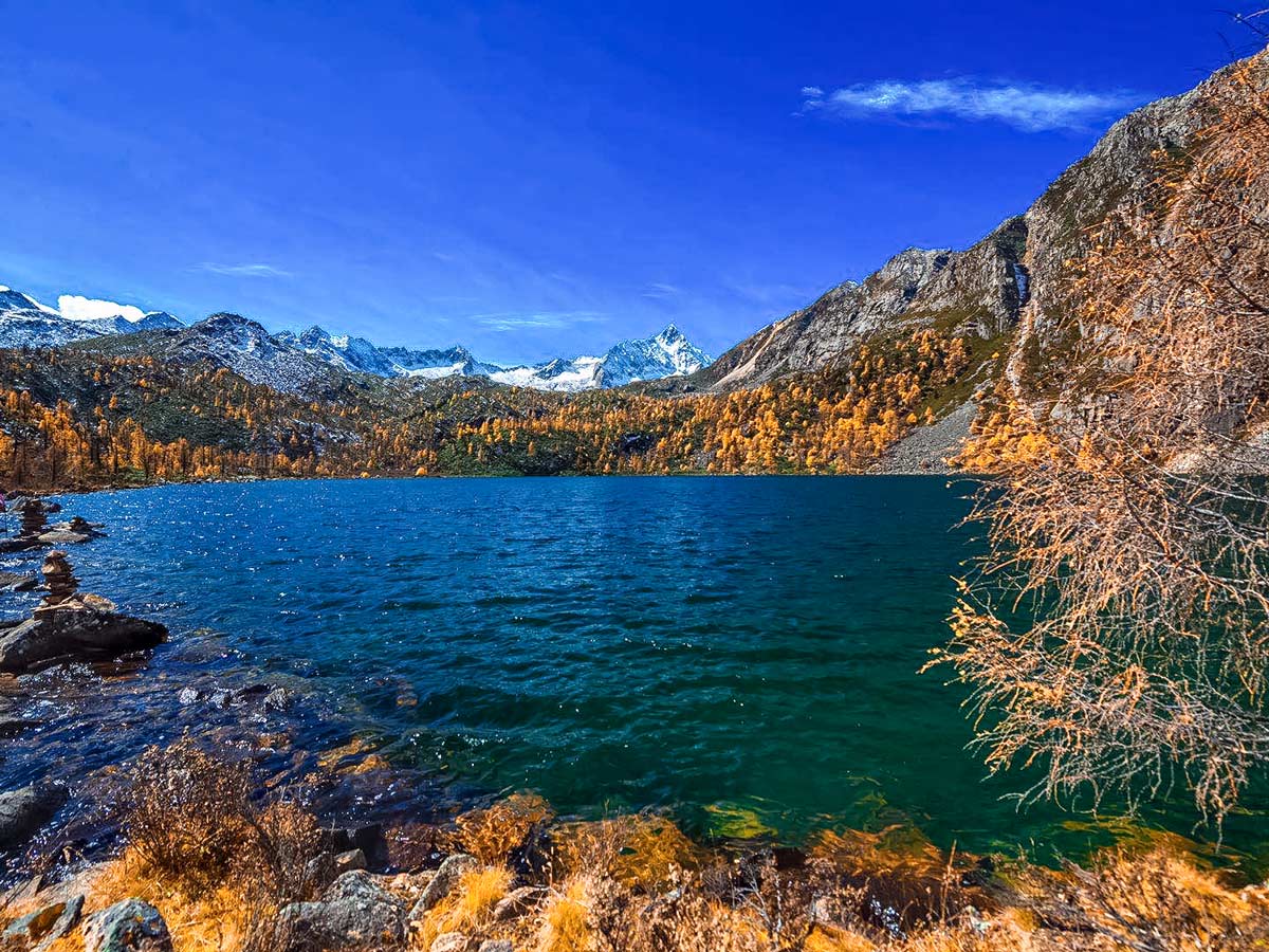 Windy day on Hulu Lake in Dangling seen along trekking tour through West Sichuan