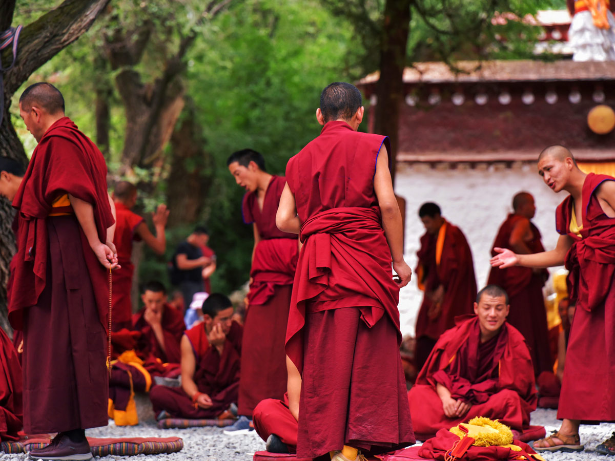 Debate between Monks in Sera along bike tour in Central Tibet