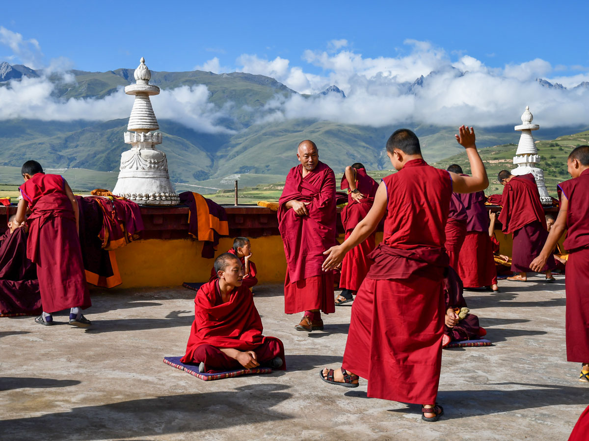 Robed Monks debate in Ganzi Monastery in West Sichuan