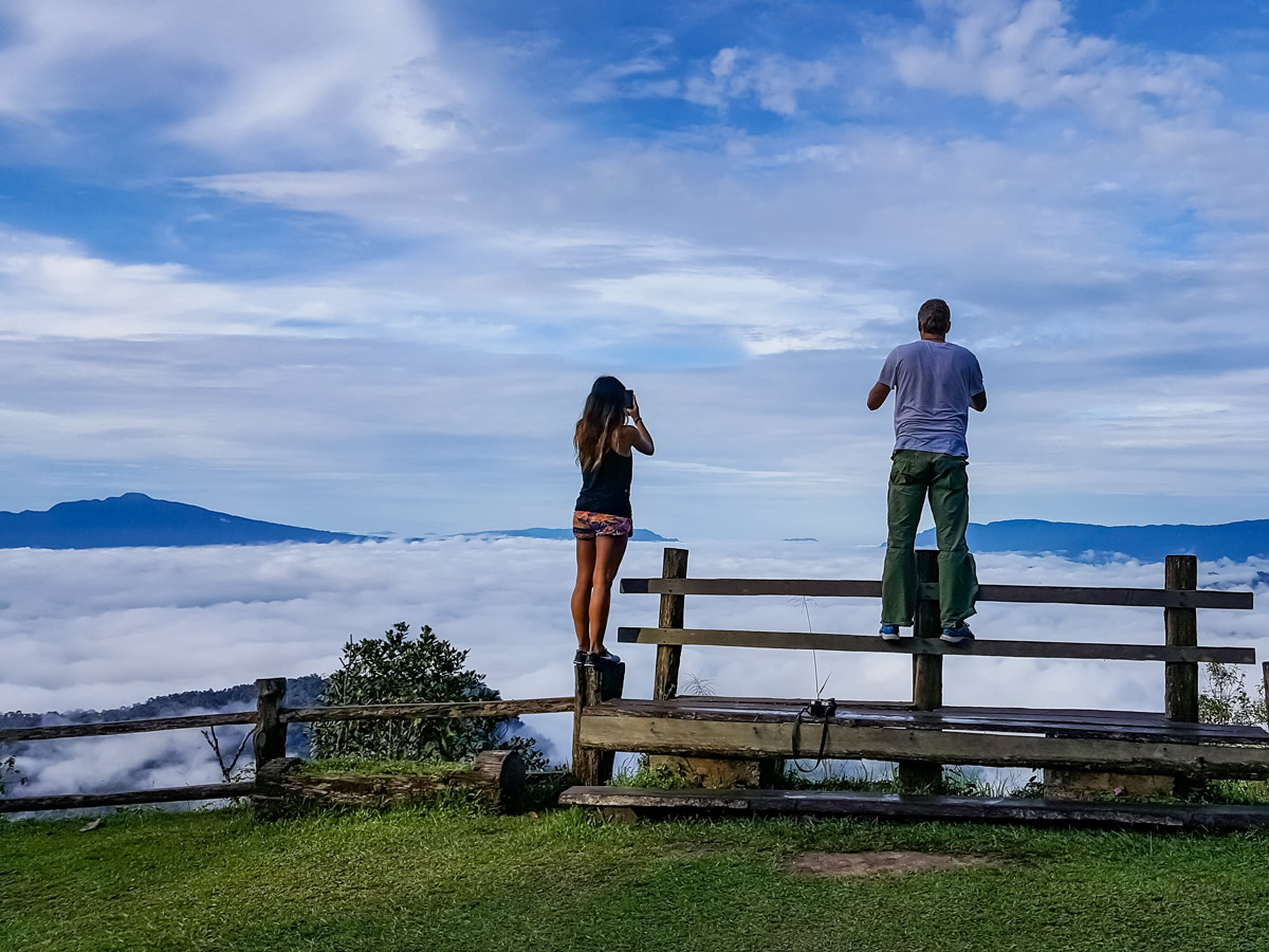 Trekkers take photos along Sarawak Rainforest Adventure tour in Malaysia