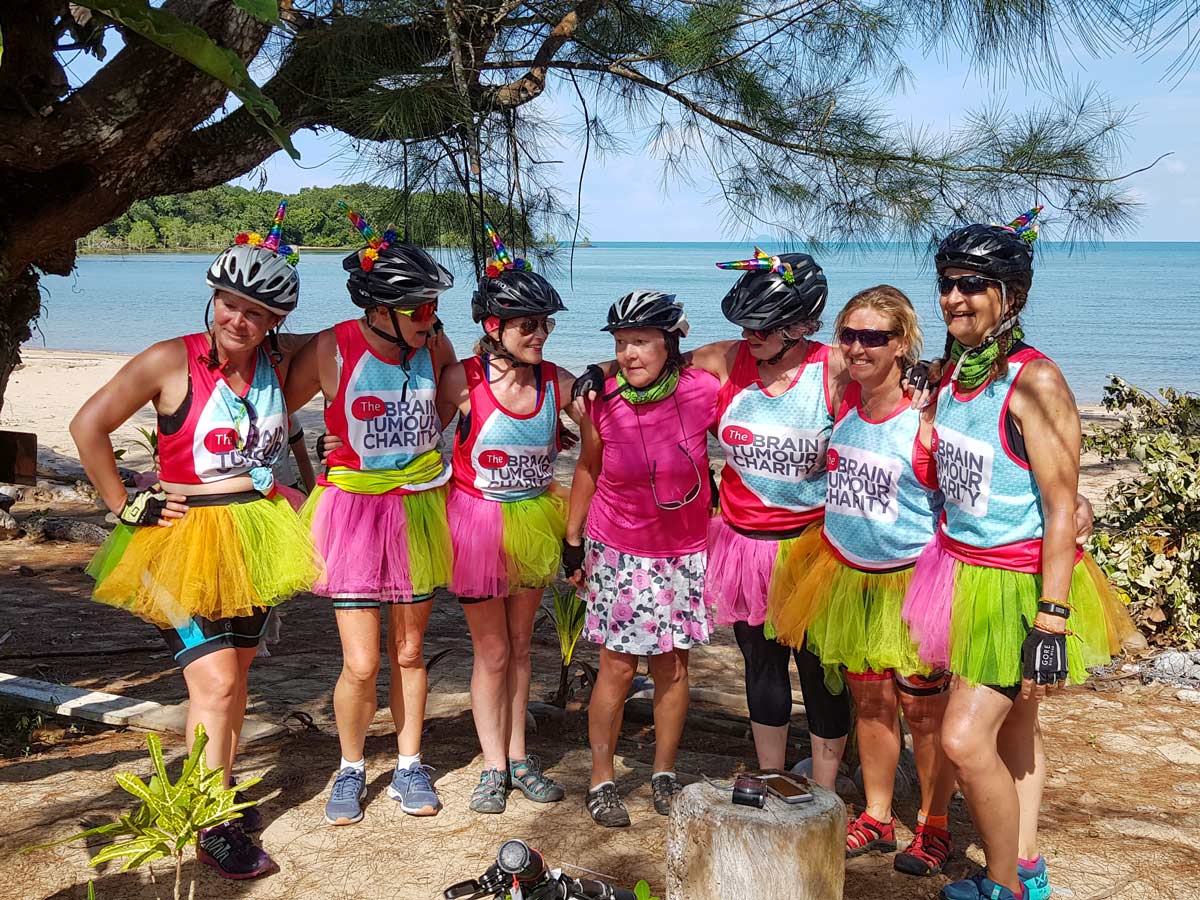 Brain Tumour Charity costumed unicorn bike ride along Malaysia biking tour